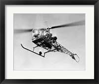 Low angle view of military helicopter in flight Fine Art Print