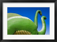 Sculptures of two dinosaurs outside a rock shop, Holbrook, Route 66, Arizona, USA Framed Print