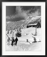 USA, Washington state, three people carrying their skis Fine Art Print