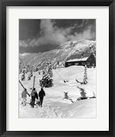 USA, Washington state, three people carrying their skis Fine Art Print