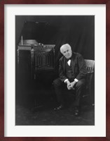 Thomas Edison, seated beside phonograph Fine Art Print