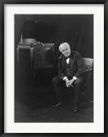Thomas Edison, seated beside phonograph Fine Art Print