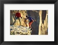 Two hikers with ropes at the edge of a cliff Fine Art Print