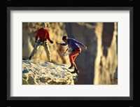 Two hikers with ropes at the edge of a cliff Fine Art Print