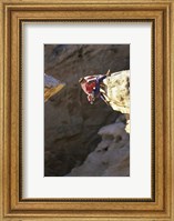 High Angle View of a Man hanging off of a Summit Fine Art Print