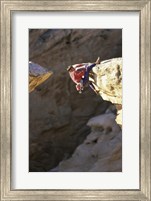 High Angle View of a Man hanging off of a Summit Fine Art Print