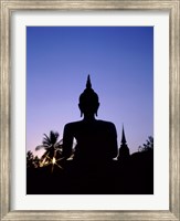 Silhouette of Buddha and temple during sunset, Sukhothai, Thailand Fine Art Print
