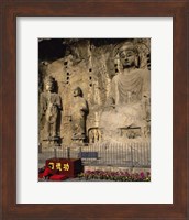 Buddha Statue in a Cave, Longmen Caves, Luoyang, China with Flowers Fine Art Print