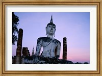 Low angle view of the Seated Buddha, Wat Mahathat, Sukhothai, Thailand Fine Art Print