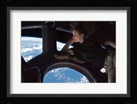 Tracy Caldwell Dyson in the Cupola Observing the Earth during Expedition 24 Fine Art Print