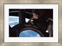 Tracy Caldwell Dyson in the Cupola Observing the Earth during Expedition 24 Fine Art Print