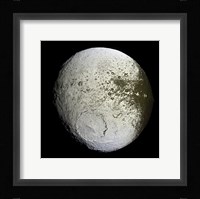 Saturn's Moon Lapetus Framed Print