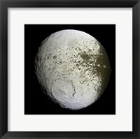 Saturn's Moon Lapetus Framed Print