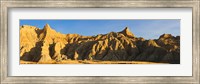 Sculpted sandstone spires in golden light, Saddle Pass Trail, Badlands National Park, South Dakota, USA Fine Art Print