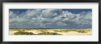 Clouds over the beach with California Lighthouse in the background, Aruba Fine Art Print