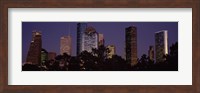 Buildings in a city lit up at dusk, Houston, Harris county, Texas, USA Fine Art Print