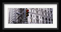 Low angle view of a Red traffic light in front of a building, Wall Street, New York City Fine Art Print