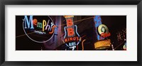 Low angle view of neon signs lit up at night, Beale Street, Memphis, Tennessee, USA Fine Art Print