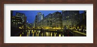 Low angle view of buildings lit up at night, Chicago River, Chicago, Illinois, USA Fine Art Print