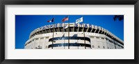 Flags in front of a stadium, Yankee Stadium, New York City Framed Print