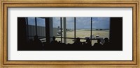 Silhouette of a group of people at an airport lounge, Orlando International Airport, Orlando, Florida, USA Fine Art Print