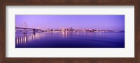 Bay Bridge with a lit up city skyline in the background, San Francisco, California, USA Fine Art Print