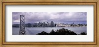 Bridge across a bay with city skyline in the background, Bay Bridge, San Francisco Bay, San Francisco, California, USA Fine Art Print
