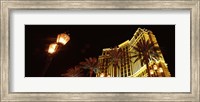 Low angle view of a hotel lit up at night, The Strip, Las Vegas, Nevada, USA Fine Art Print