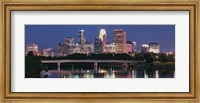 Buildings lit up at night in a city, Minneapolis, Mississippi River, Hennepin County, Minnesota, USA Fine Art Print