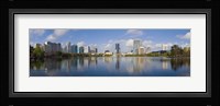 Reflection of buildings in a lake, Lake Eola, Orlando, Orange County, Florida, USA 2010 Fine Art Print