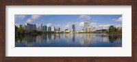 Reflection of buildings in a lake, Lake Eola, Orlando, Orange County, Florida, USA 2010 Fine Art Print