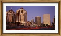 USA, California, Oakland, Alameda County, New City Center, Buildings lit up at night Fine Art Print