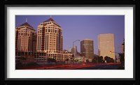 USA, California, Oakland, Alameda County, New City Center, Buildings lit up at night Fine Art Print