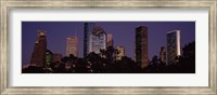 Buildings in a city lit up at dusk, Houston, Harris county, Texas, USA Fine Art Print