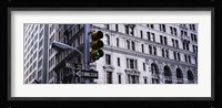 Low angle view of a Green traffic light in front of a building, Wall Street, New York City Fine Art Print