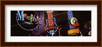 Low angle view of neon signs lit up at night, Beale Street, Memphis, Tennessee, USA Fine Art Print
