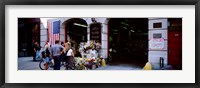 Rear view of three people standing in front of a memorial at a fire station, New York City, New York State, USA Fine Art Print