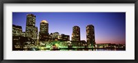 Skyscrapers at the waterfront lit up at night, Boston, Massachusetts, USA Fine Art Print