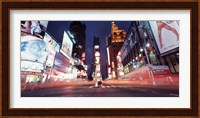 Low angle view of sign boards lit up at night, Times Square, New York City, New York, USA Fine Art Print