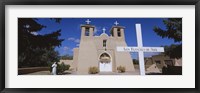 Cross in front of a church, San Francisco de Asis Church, Ranchos De Taos, New Mexico, USA Fine Art Print