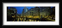 Low angle view of buildings lit up at night, Chicago River, Chicago, Illinois, USA Fine Art Print