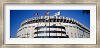 Flags in front of a stadium, Yankee Stadium, New York City Fine Art Print