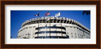 Flags in front of a stadium, Yankee Stadium, New York City Fine Art Print