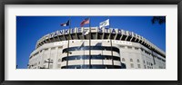 Flags in front of a stadium, Yankee Stadium, New York City Framed Print