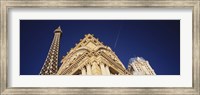 Low angle view of a building in front of a replica of the Eiffel Tower, Paris Hotel, Las Vegas, Nevada, USA Fine Art Print
