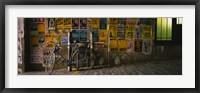 Bicycle leaning against a wall with posters in an alley, Post Alley, Seattle, Washington State, USA Fine Art Print