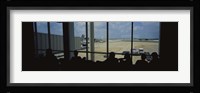 Silhouette of a group of people at an airport lounge, Orlando International Airport, Orlando, Florida, USA Fine Art Print