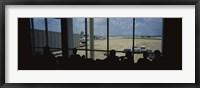 Silhouette of a group of people at an airport lounge, Orlando International Airport, Orlando, Florida, USA Fine Art Print
