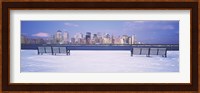 Park benches in snow with a city in the background, Lower Manhattan, Manhattan, New York City, New York State, USA Fine Art Print