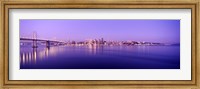 Bay Bridge with a lit up city skyline in the background, San Francisco, California, USA Fine Art Print